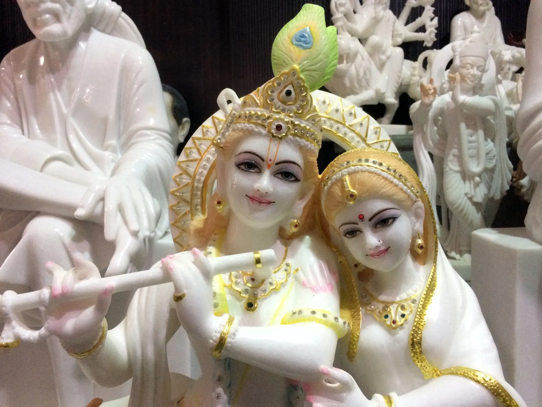 White marble Radha and Krishna with hand-painted and gilded detail